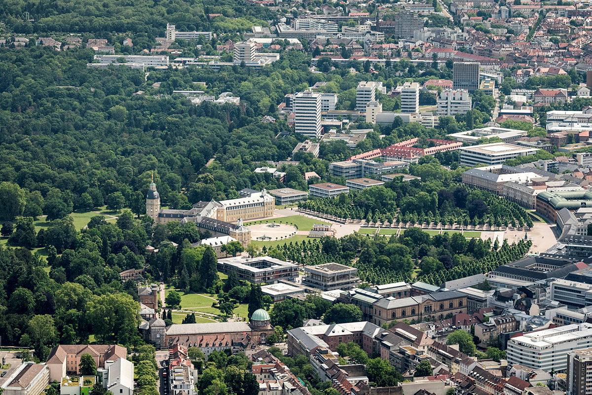 Aerial view of Karlsruhe with Karlsruhe Castle, green parks, and Campus South in the background